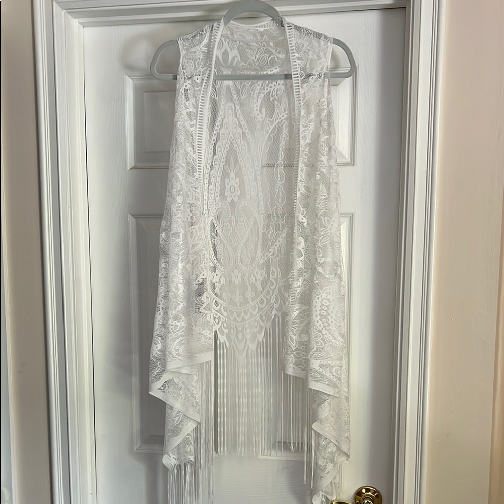 Lace vest. Fringed. 49” length. White. NWT